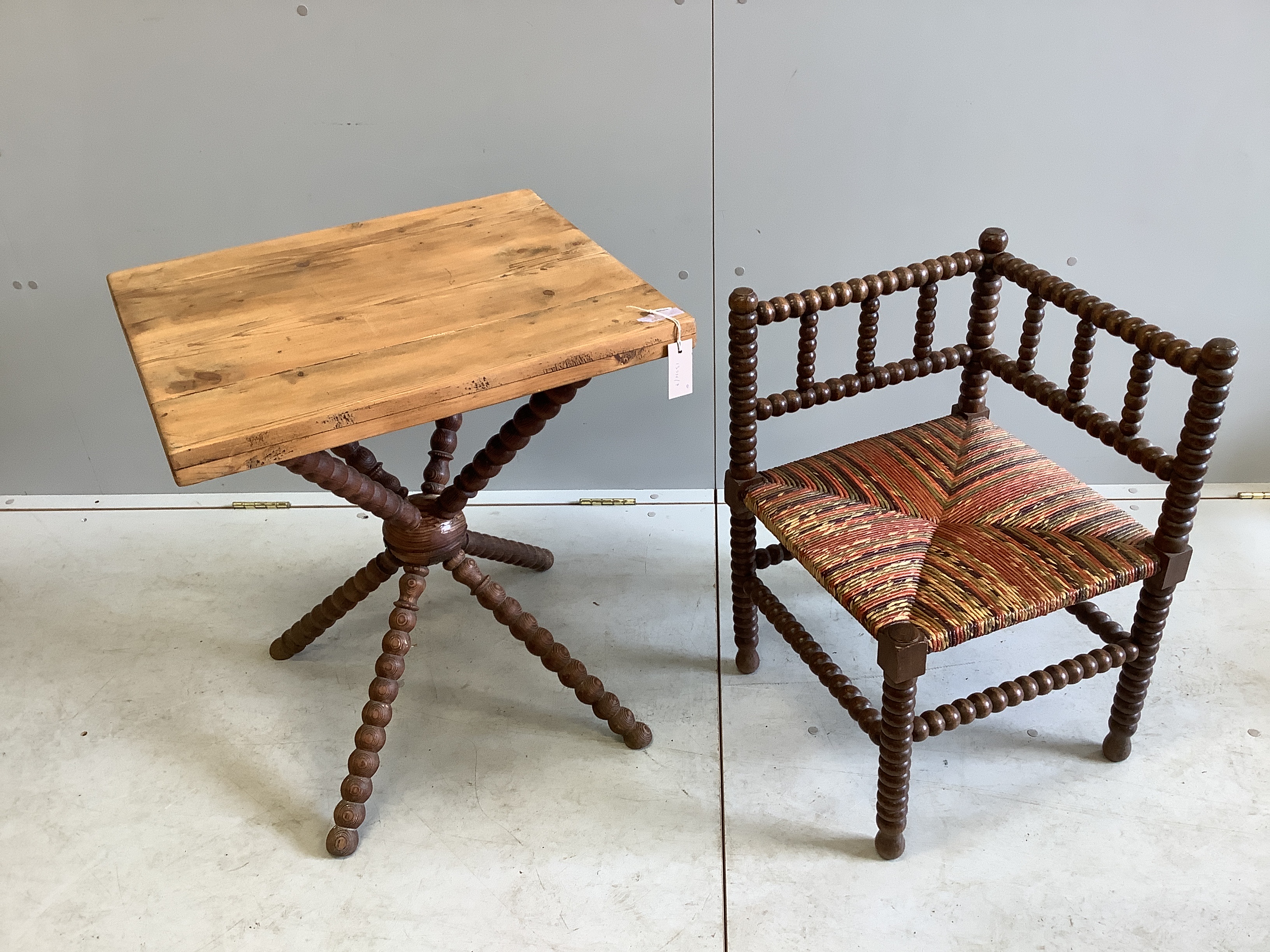 A late Victorian beech bobbin turned corner chair together with a bobbin turned occasional table with associated pine top, width 60cm, depth 50cm, height 66cm